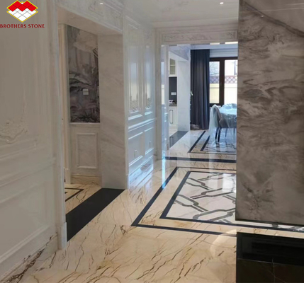 Interieur trappen en vloer tegels Solfitel goud marmer grote plaat in moderne natuurlijke stijl
