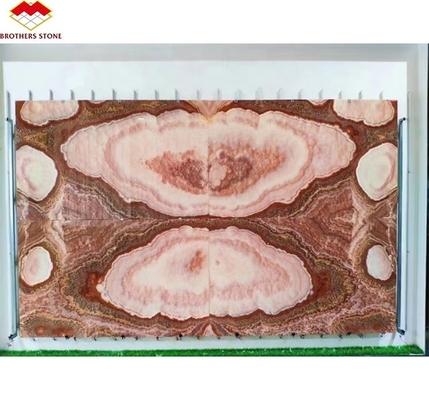 Achtergrondverlichting Rood Onyx Marmeren Steen Boek Matched Slab voor Transparante Marmeren Tafel Patroon