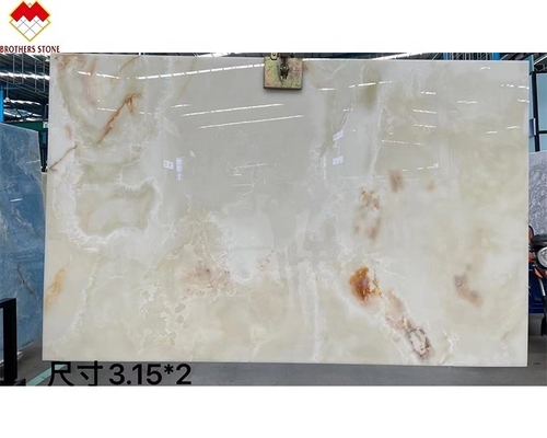 Doorzichtige witte onyx marmer grote plaat achtergrondverlichting rode/gouden aders voor hoteldecoratie