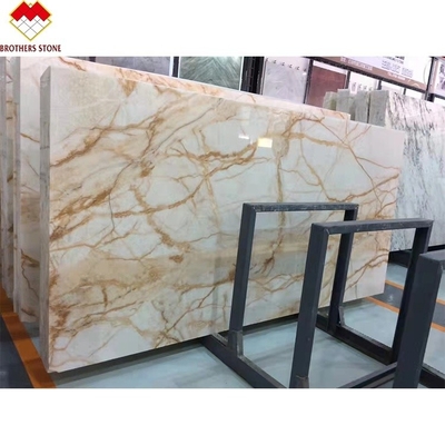 Groothandel achtergrondverlichting gouden aders onyx doorschijnend spinnenwit goud korrels jade onyx steen